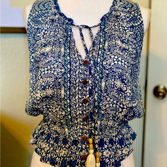 Sleeveless Boho Blouse with Tassel Detail - Picture 1 of 5